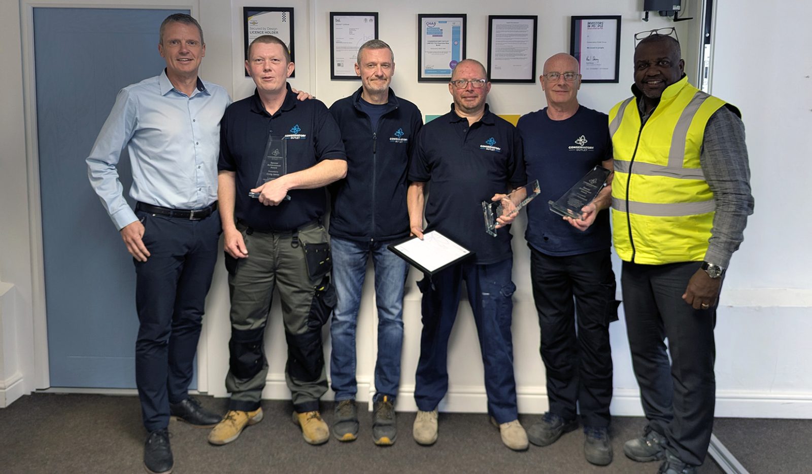 L-R: Greg Kane (CEO of Conservatory Outlet), Craig Jarvis, Craig Levin, Andrew Wildsmith, Glyn Beaumont and Mick Giscombe (MD of Conservatory Outlet)